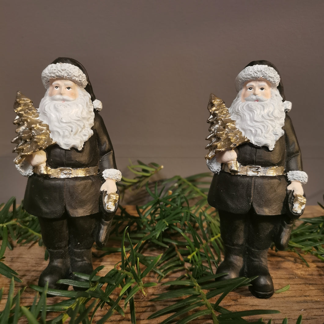Weihnachtsmann in schwarz-weiß-silbergold mit netten kleinen Accessoires